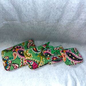 Set of 4 Vera Bradley bags with a variety of sizes